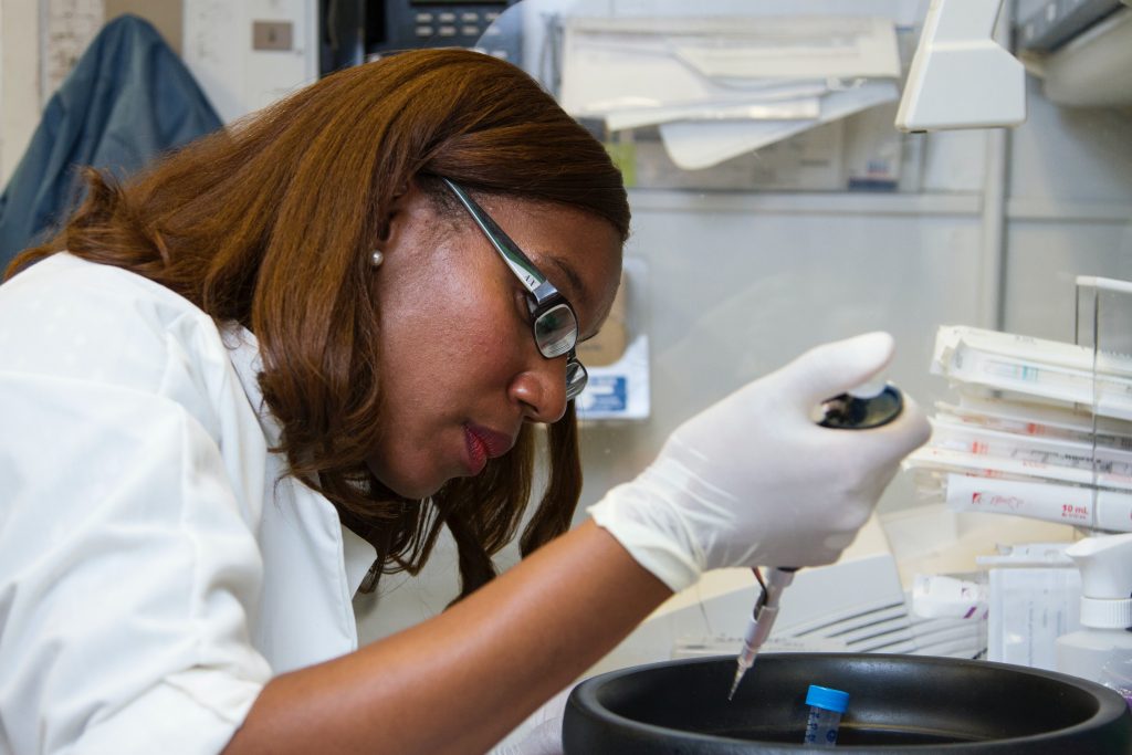 black female scientist working in laboratory